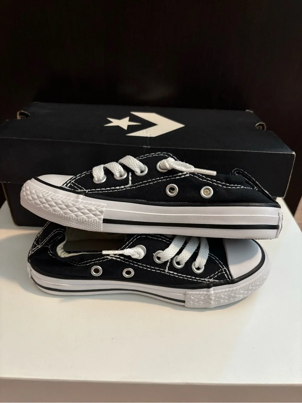 Kid’s Converse Black and White Unisex Low-Top Canvas Sneaker Pair